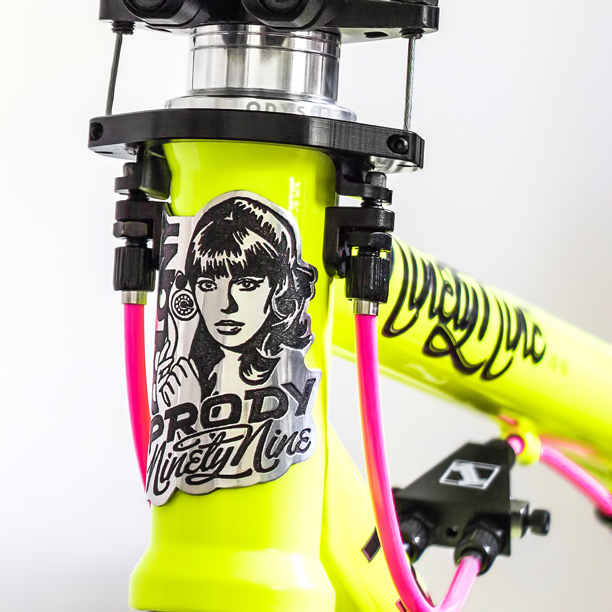 Finished electrochemically etched Prody 99 head tube badge