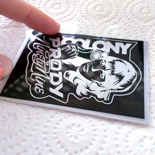 Prody badge step 3 — iron transfer to aluminium plate