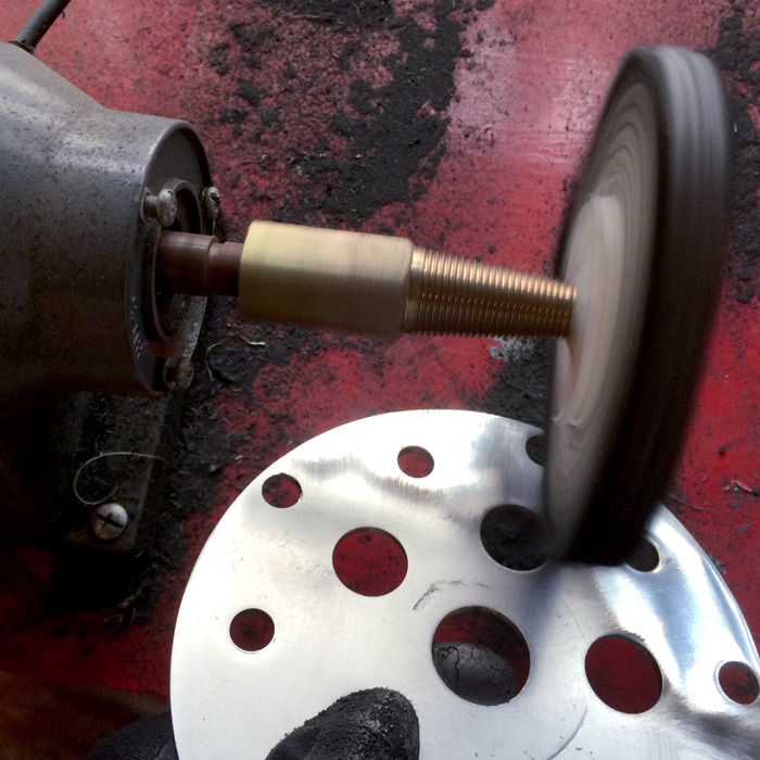 Polishing Tioga Power Disc with sisal wheel