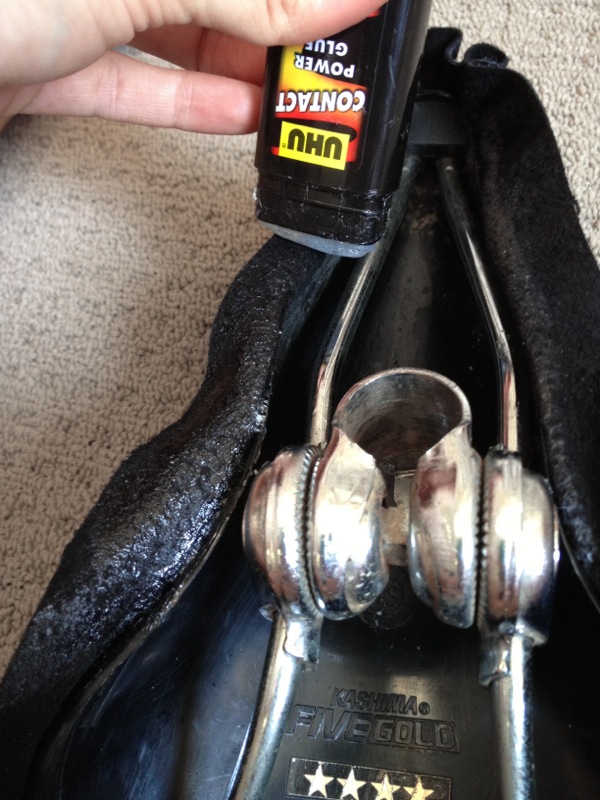 Tucking suede at nose of seat — step 25